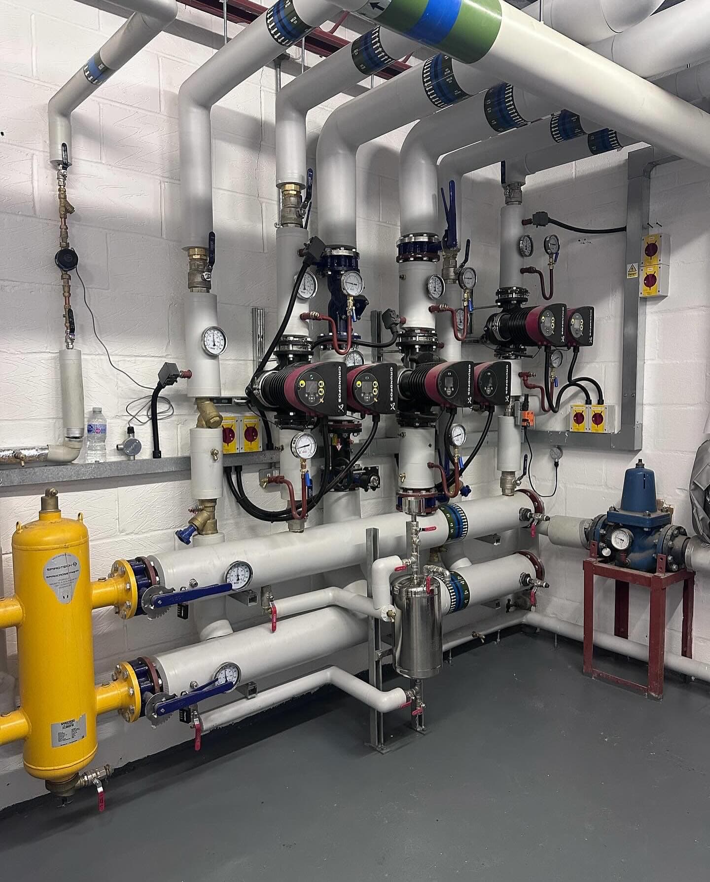 Insulated headers and pipework in the rebuilt Portchester school plant room