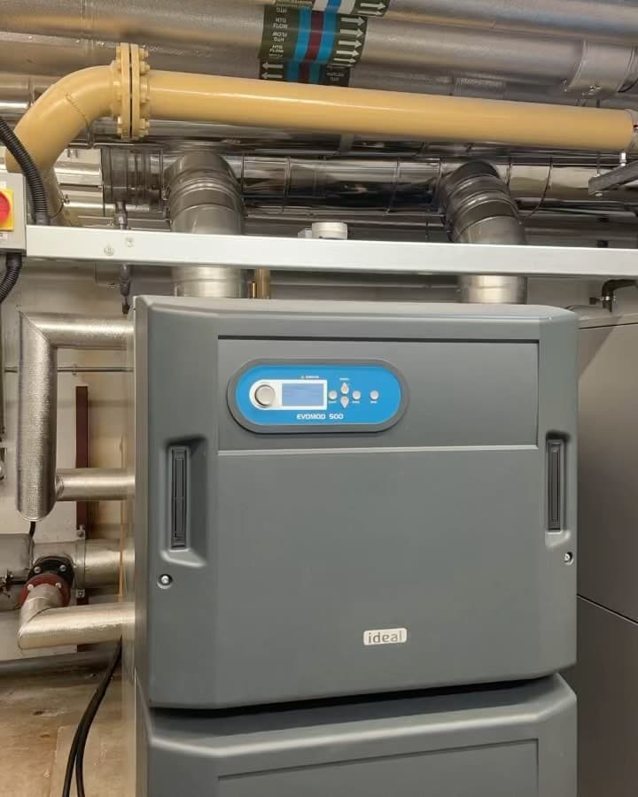Four commercial boilers supplying heating and hot water for over 200 apartments in east London