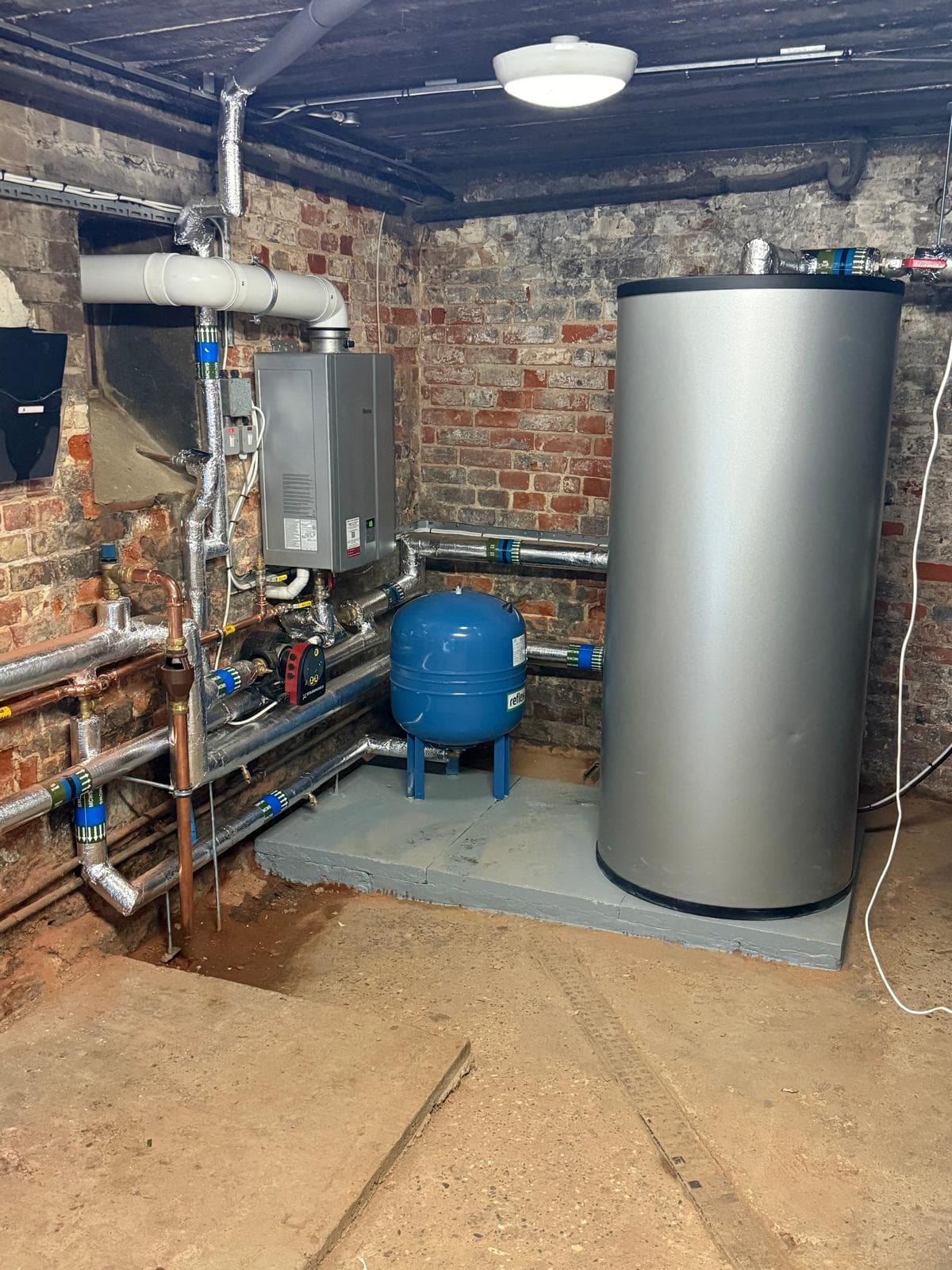 Hot water plant with storage cylinder and expansion vessel in the care home plant room