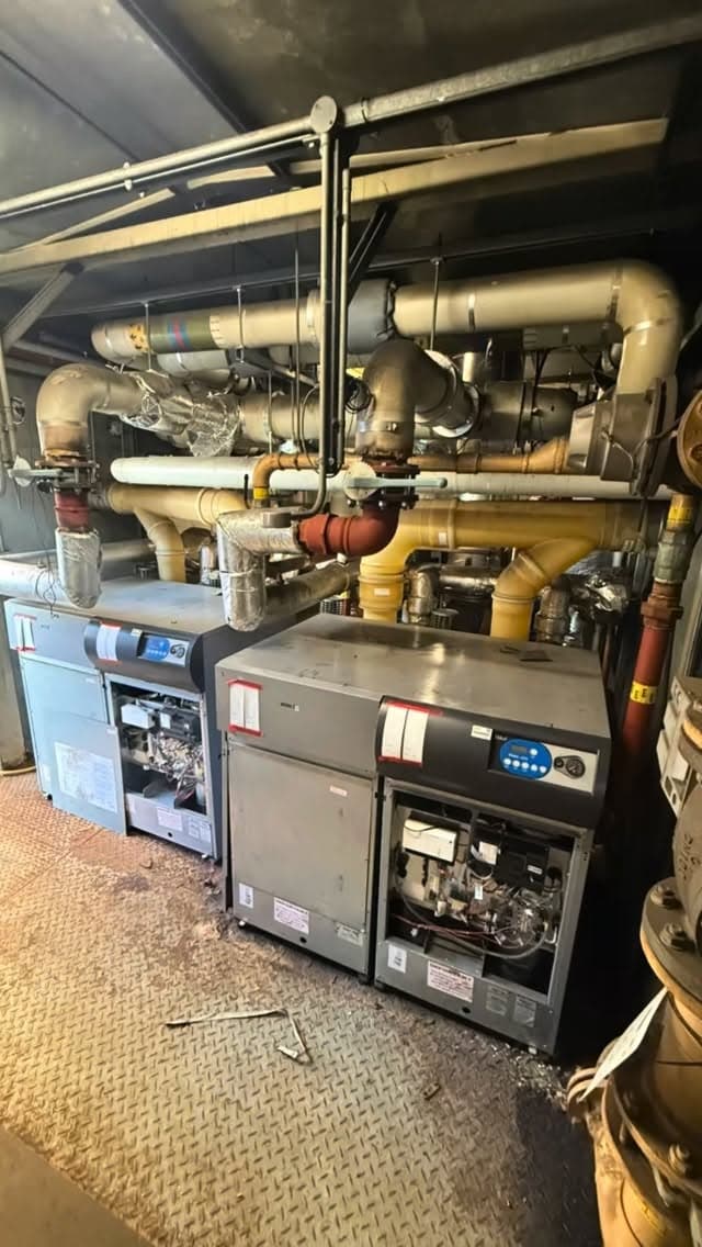 Two Ideal iMax Xtra 280kW commercial boilers installed at a Tesco Extra plant room