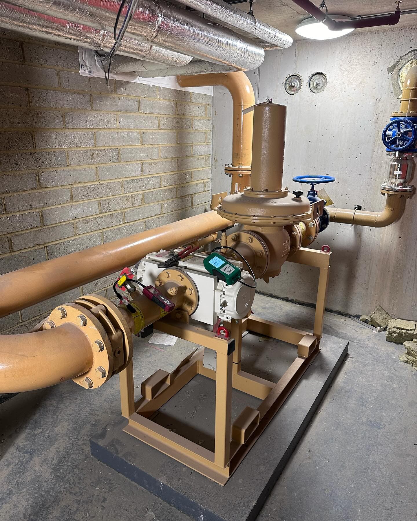 Commercial gas booster set undergoing testing and purging in a London plant room