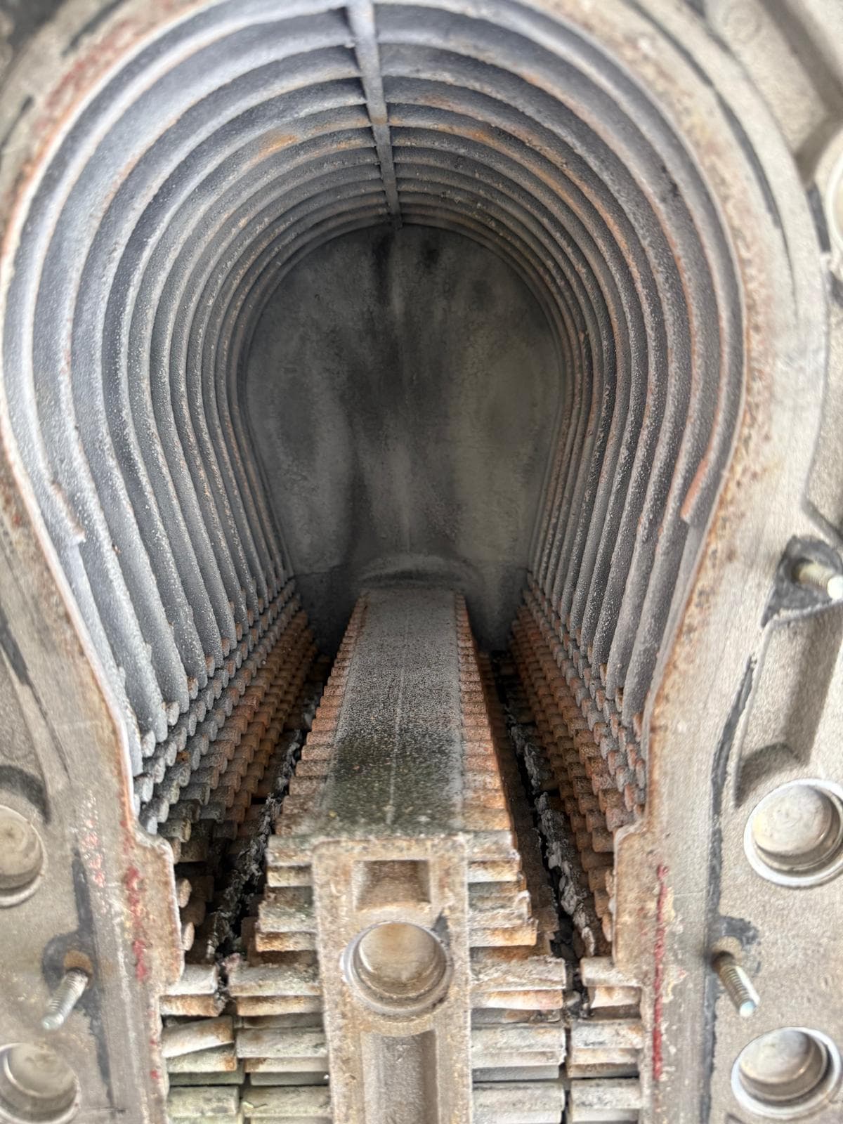 Inside the combustion chamber of a commercial boiler during a service at a care home in Worthing